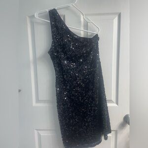 One should black sparkly dress